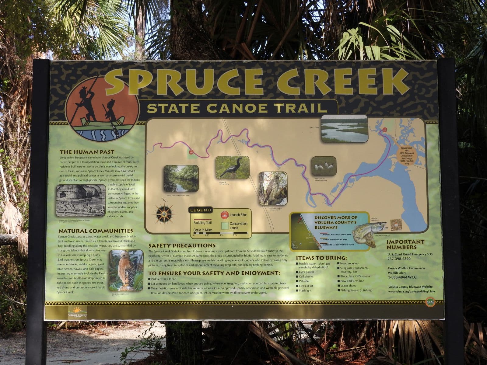 Wooded trail entrance at Spruce Creek Park in Port Orange.
